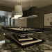 A MBM Biliardi Ziggurat pool table with a modern, floating appearance and a multi-layered wooden base, illuminated in a contemporary interior space.
