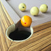 Corner detail of an MBM Biliardi Ziggurat pool table, highlighting the wood frame and smooth lilac playing surface.