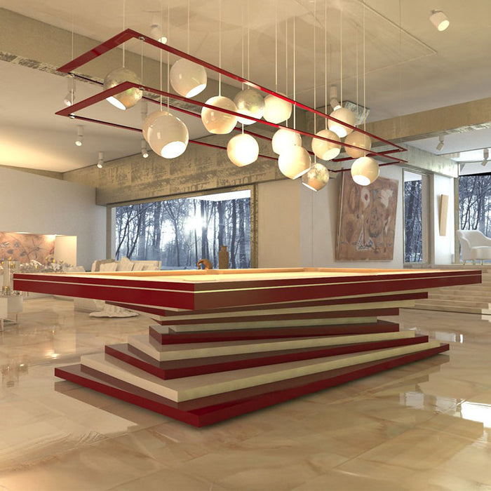 A contemporary MBM Biliardi Ziggurat pool table with a beige finish, featuring a stacked, spiraling base, in a luxury lounge setting with pendant lighting and the MBM Biliardi logo.