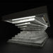 A dramatic low-angle render of the MBM Biliardi Ziggurat pool table with a black frame and a spiraling white marble-effect base, set against a dark background.