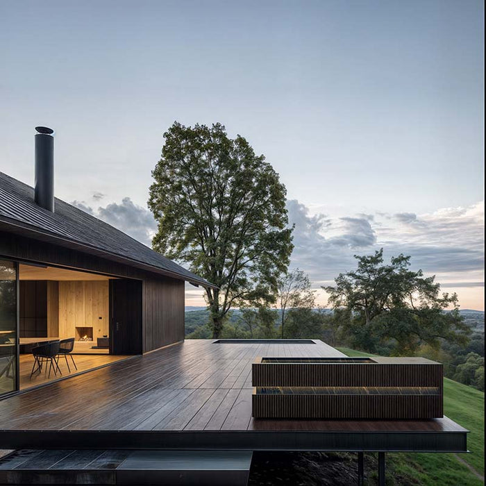 Ribbed wood Nordic Vitality LOKI Ice Bath on an elevated deck overlooking a scenic valley, perfect for nature-inspired cold plunge therapy.