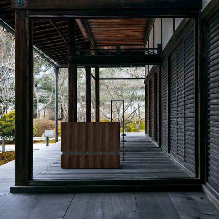 Nordic Vitality THOR Ice Bath in Thermo Ash finish placed on a traditional Japanese-style wooden veranda, blending natural wood tones with minimalist design.