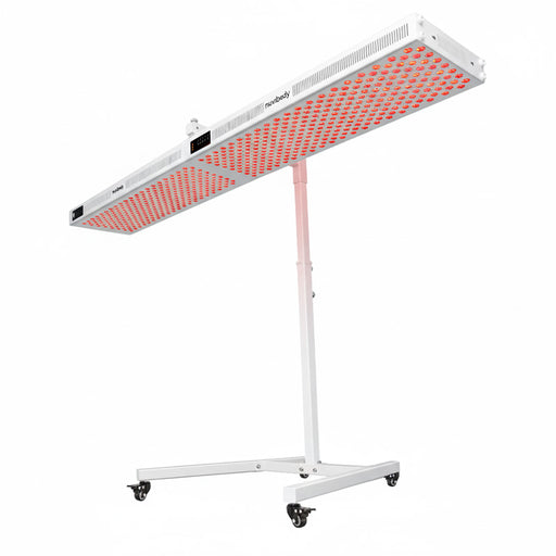 Nuvibody CORE 1500 QUAD Red Light Therapy panel in horizontal position on adjustable mobile stand, designed for overhead treatment targeting large areas.