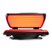 Straight-on front view of the Nuvibody CORE bed with high-intensity red light fully illuminated inside for treatment.