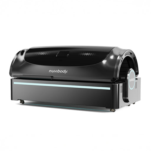 Sleek black Nuvibody PRO red light therapy bed shown closed from an angled side view with illuminated brand logo and premium finish.