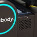 Close-up detail of the Nuvibody PRO Red Light Therapy Bed branded side panel, featuring illuminated accent lighting and premium engineering finishes.