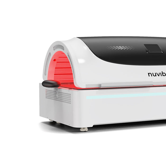 Nuvibody PRO Red Light Therapy Bed side detail showing illuminated red light therapy chamber, ergonomic access point and advanced wellness technology.