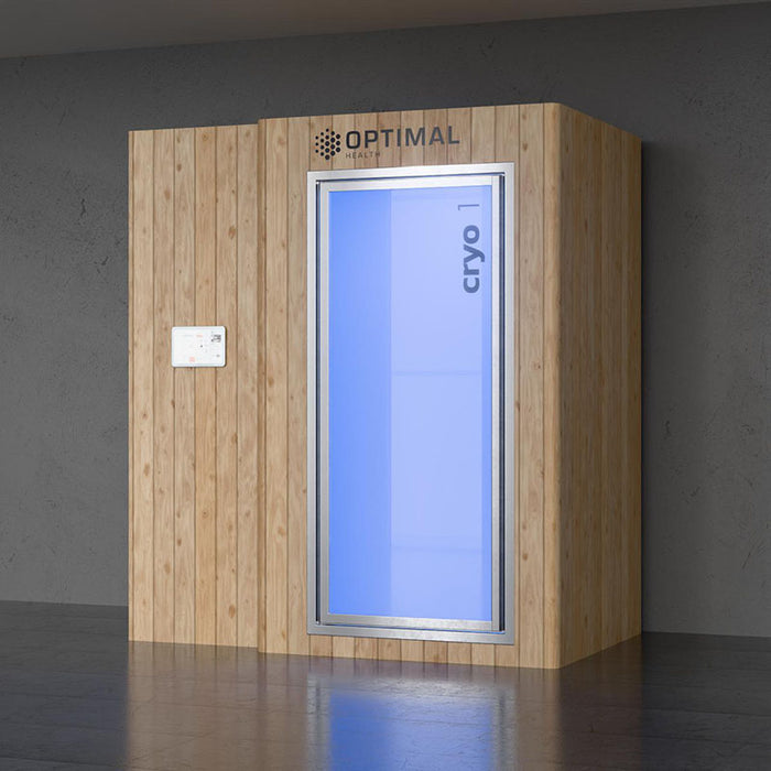 Wood-panelled Optimal Health cryotherapy chamber with electric freezing technology and blue-lit door, blending natural aesthetic with high-performance cryo wellness.