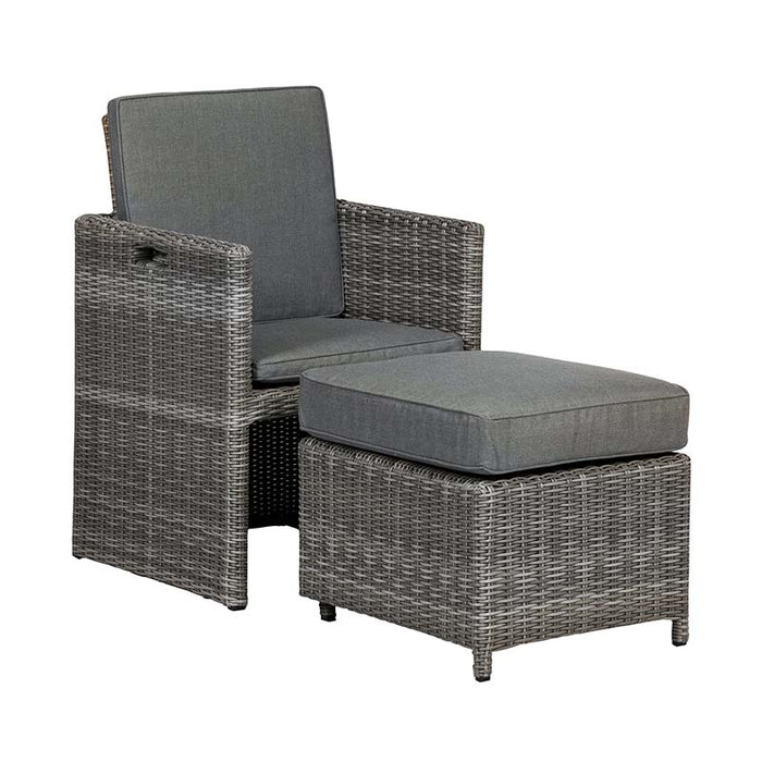 The Paris 10 Seater Cube Set's comfortable chair and matching stool in grey rattan, designed for versatile outdoor seating.