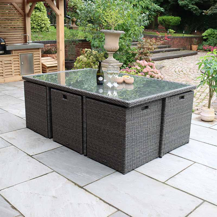 The Paris 10 Seater Cube Set in grey rattan, with its glass table and comfortable seating, is an excellent addition to any outdoor area.