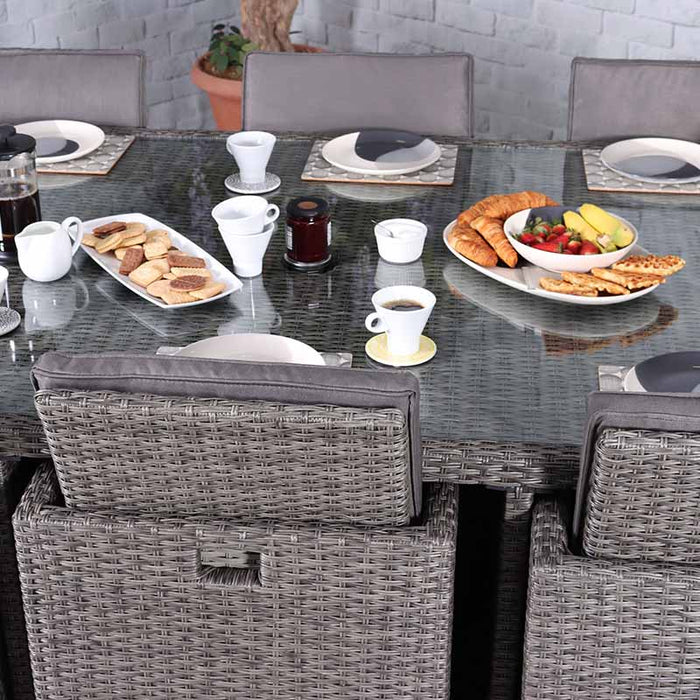 A close-up of the Paris 10 Seater Cube Set’s breakfast setup on the glass-topped table, showcasing the elegant design and functionality.