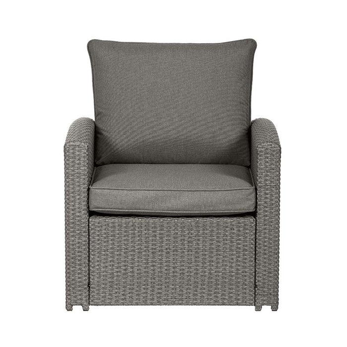 Front view of the armchair from the Paris 7 Seater Deluxe Sofa Dining Set, highlighting the comfortable grey cushions and elegant wicker design, perfect for outdoor seating.