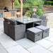 Paris 8 Seater Cube Set arranged in a stylish garden, perfect for outdoor meals and gatherings.