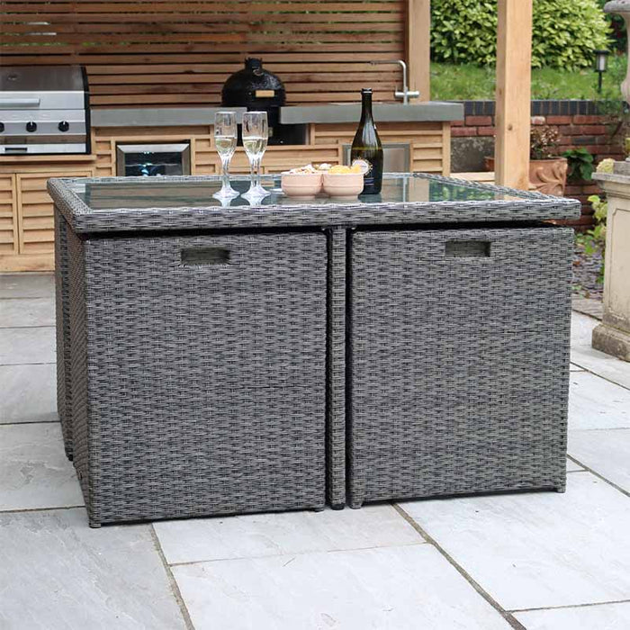 Neatly arranged Paris 8 Seater Cube Set in a modern garden, ideal for versatile outdoor living.