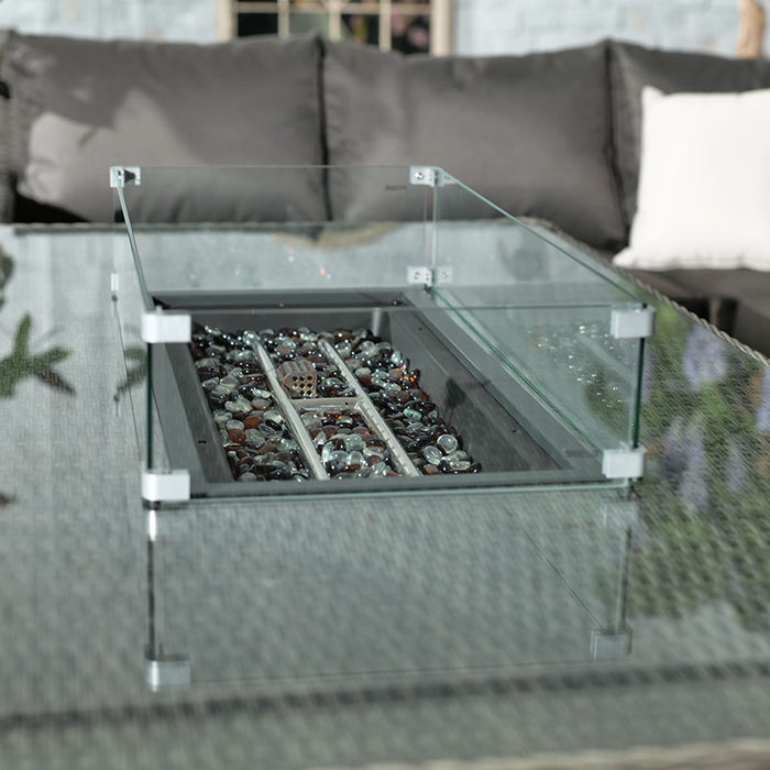 A detailed view of the Paris Fire Pit Corner Dining & Lounge Set’s fire pit table with a glass surround, designed for safety and style in your outdoor space.