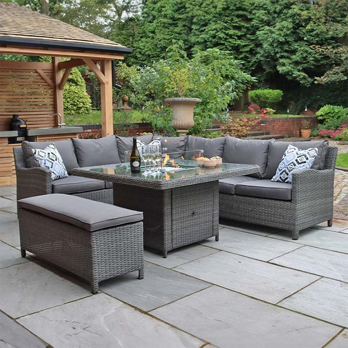 Outdoor setting of the Paris Fire Pit Corner Dining & Lounge Set, highlighting the rattan weave and fire pit table.