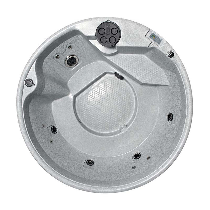 Top-down view of a light grey circular hot tub with multiple seats.