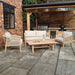 Roma 4 Seater Double Lounge Set with acacia wood frame and beige cushions, set up in a cosy outdoor patio area, ideal for relaxing and entertaining.