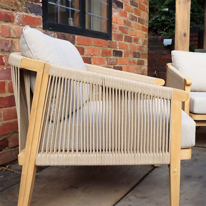 Side view of the Roma garden lounge chair, part of the Roma 4 Seater Double Lounge Set, featuring stylish rope weave on the sides and a sturdy acacia wood frame, perfect for any outdoor setting.