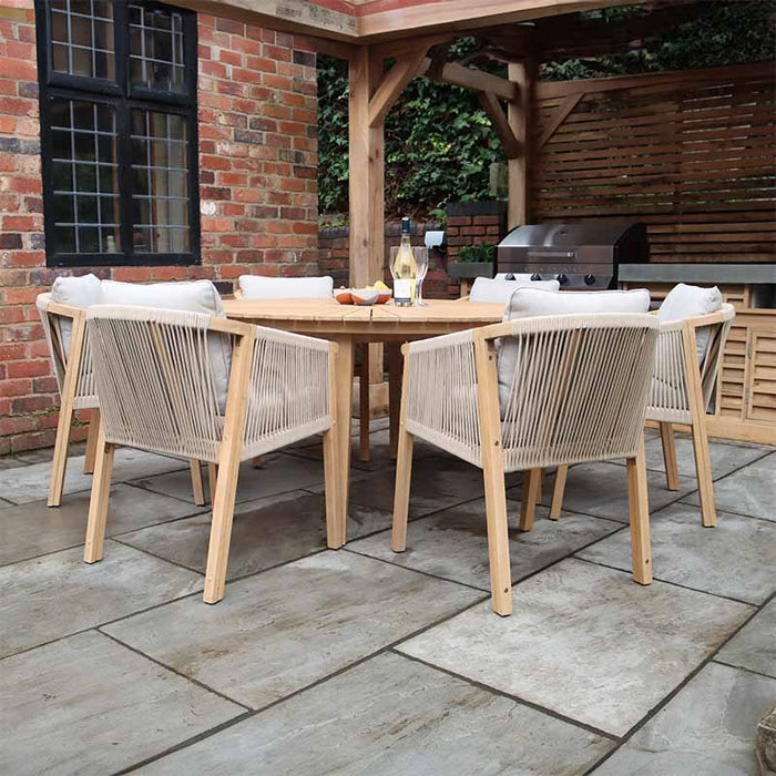 Elegant Roma 6 Seater Dining Set with Deluxe Rope Chairs, showcasing a round teak wood table and comfortable outdoor rope chairs, ideal for sophisticated patio dining.