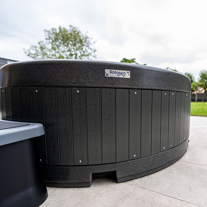 Close-up of Rotospa Orbis Hot Tub showing durable and weatherproof outdoor design.