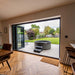 Indoor-outdoor view of Rotospa Orbis Hot Tub offering a luxury spa experience at home.