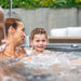 Low maintenance and weatherproof build of the Rotospa Orbis Hot Tub in a garden setting.