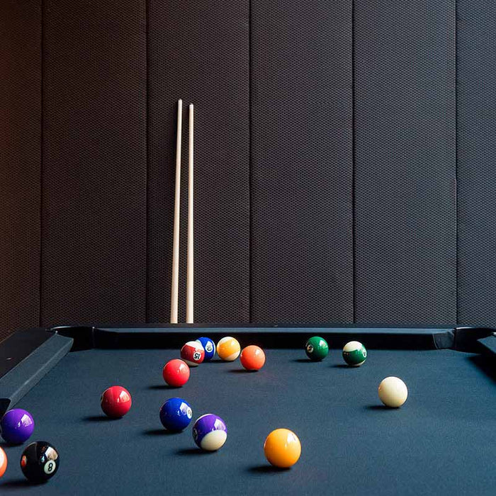 RS Barcelona Diagonal outdoor pool table playing surface with colourful billiard balls, modern pool table felt detail with cues in background.