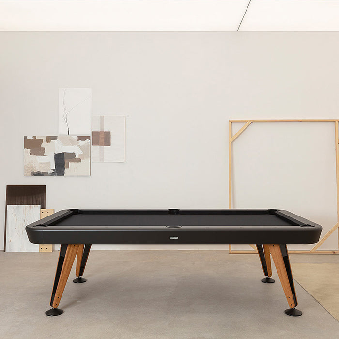 RS Barcelona Diagonal outdoor pool table in black finish with wooden legs, contemporary billiard table in minimalist studio interior setting.