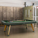 RS Barcelona Diagonal outdoor pool table in green finish with balls and cues, industrial style interior with lockers and modern billiard table design.