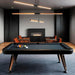 RS Barcelona Diagonal outdoor pool table with minimalist black frame in stylish living space, contemporary pool table with fireplace backdrop.