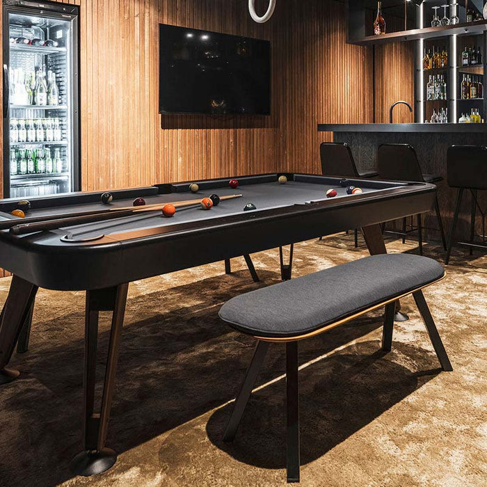 RS Barcelona Diagonal outdoor pool table in a modern luxury games room with black finish, sleek design, contemporary billiards table with ambient lighting.
