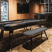 RS Barcelona Diagonal outdoor pool table in a modern luxury games room with black finish, sleek design, contemporary billiards table with ambient lighting.