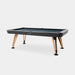 RS Barcelona Diagonal pool table with black frame and wooden legs displayed in angled perspective view highlighting its modern designer structure.