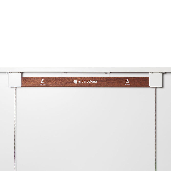 Close-up of RS Barcelona table tennis folding mechanism with branded wooden bar and secure push system for easy storage and compact folding.