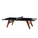 Minimalist RS Barcelona ping pong table in black finish with modern wooden legs, ideal for contemporary interiors.