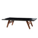 RS Barcelona ping pong table without net featuring a smooth black surface and refined wooden base for a multifunctional look.