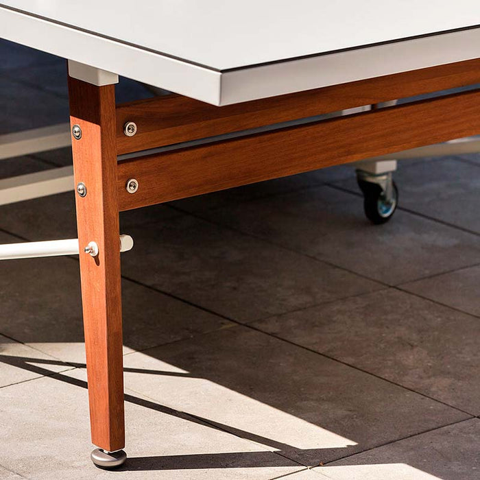 RS Barcelona ping pong table wooden leg detail with sturdy construction, metal fixings and modern design for stable indoor and outdoor use.