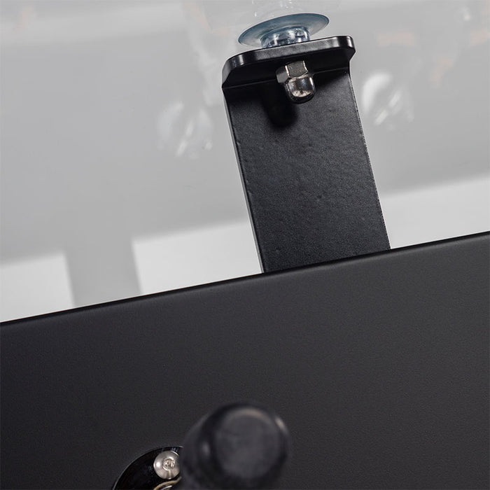 Close-up of RS Barcelona RS MAX dining football table handle, frame and glass tabletop mounting detail.