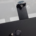 Close-up of RS Barcelona RS MAX dining football table handle, frame and glass tabletop mounting detail.