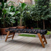 RS Barcelona RS MAX football table placed in a modern garden patio with wooden legs and black frame, a premium outdoor foosball table for entertaining.