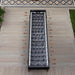 Top view of the RS Barcelona RS MAX football table with black frame and wooden handles, a large designer foosball table ideal for outdoor gardens and social spaces.