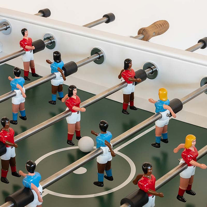 Close-up detail of RS Barcelona RS2 dining football table players and rods, premium designer foosball table with glass dining top and modern football figures.
