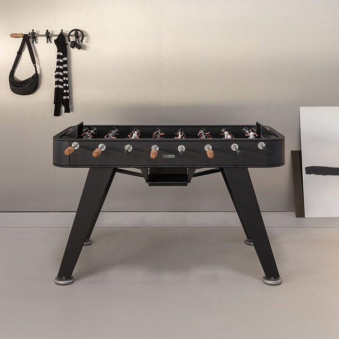 RS Barcelona RS2 football table in black with wooden handles and metal rods, modern designer foosball table for contemporary interiors.