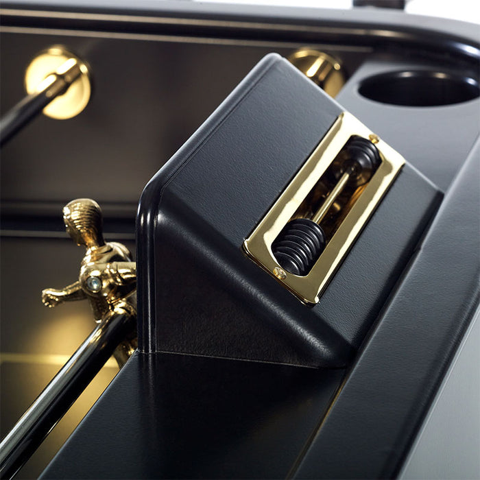 Close-up of RS Barcelona RS2 Gold football table score counter and gold detailing on black foosball table design.