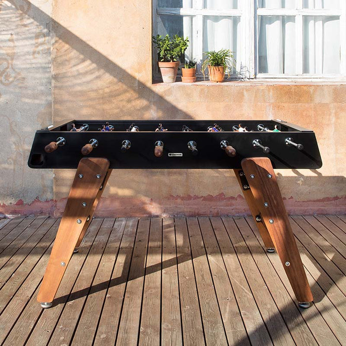 Studio product shot of RS Barcelona RS3 Wood football table in black with solid wooden legs and sleek modern foosball table design.