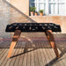 Studio product shot of RS Barcelona RS3 Wood football table in black with solid wooden legs and sleek modern foosball table design.