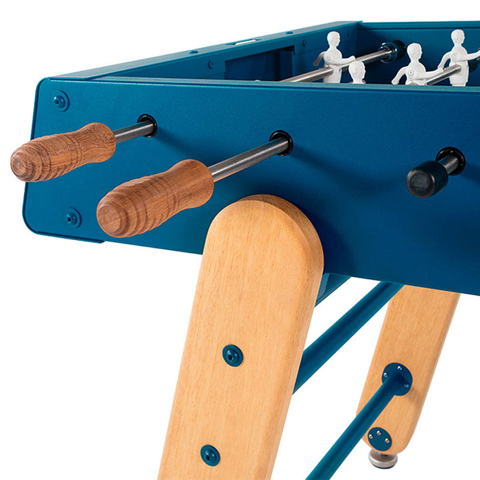 Detail of RS Barcelona RS4 Home football table with wooden handles, blue body and solid wooden legs.