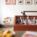 RS Barcelona RS4 Home football table in brown finish with wooden handles and player figures, modern designer foosball table.
