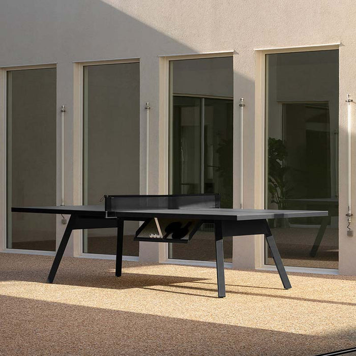 RS Barcelona You and Me monochrome ping pong table in white finish, minimalist outdoor table tennis table with clean lines in modern courtyard setting.